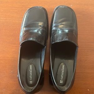 Black heeled loafers by Natualizer